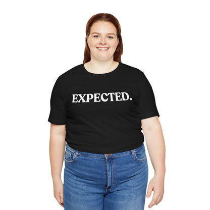 Expected — Dry Humour T-Shirt