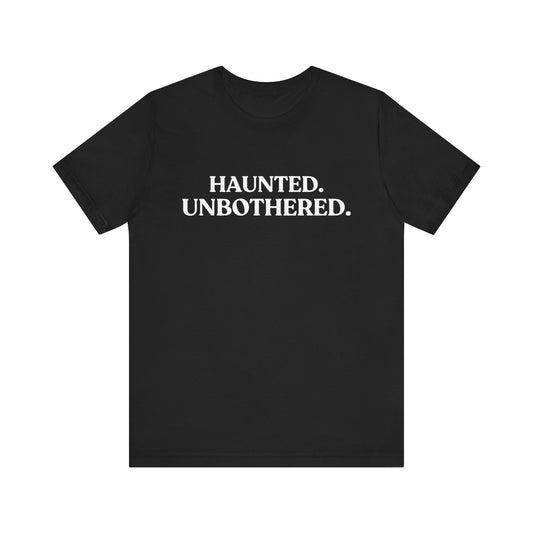 Haunted. Unbothered — Deadpan Halloween T-Shirt